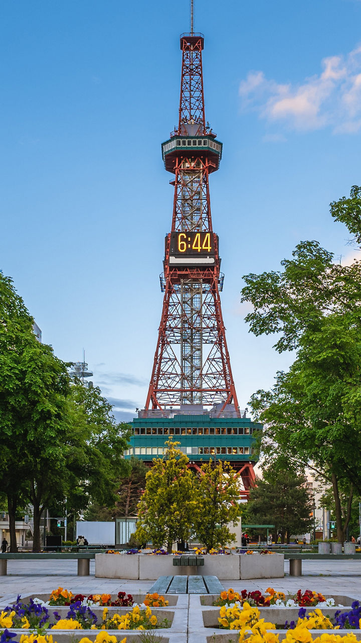 Flower garden and tower with digital clock display