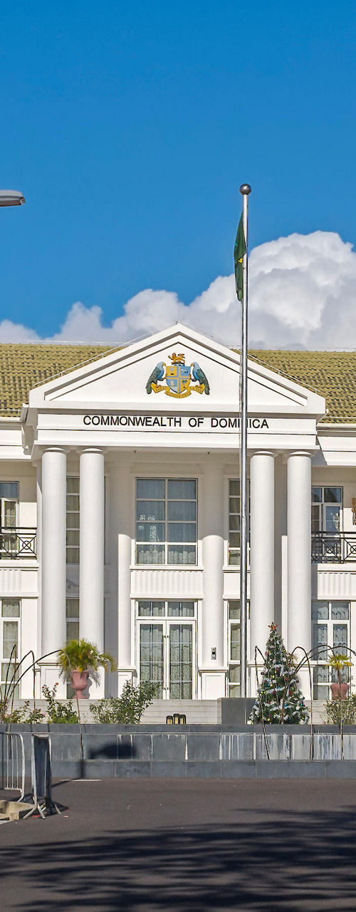 Colonial-style government building in tropical setting
