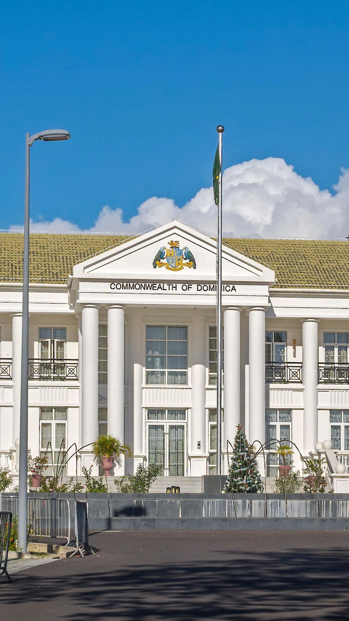 Colonial-style government building in tropical setting