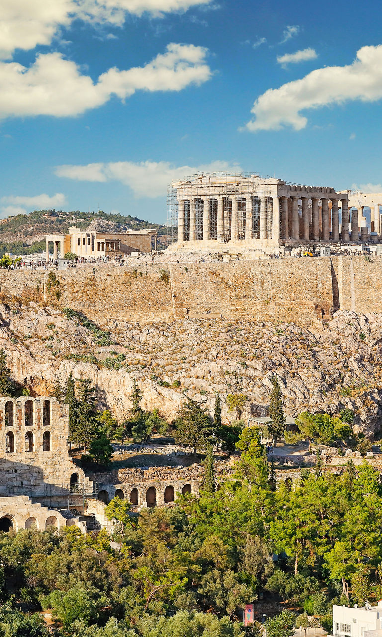 The Acropolis of Athens under blue skies
