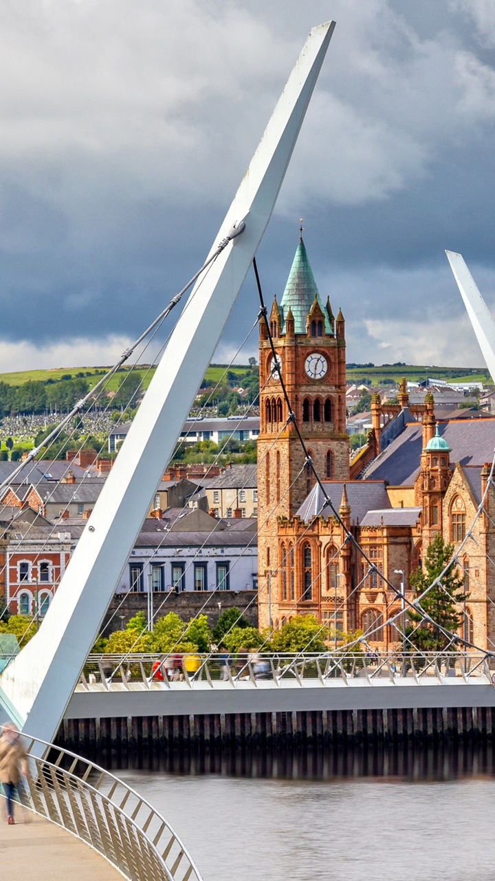 Peace Bridge and Guildhall in Derry cityscape