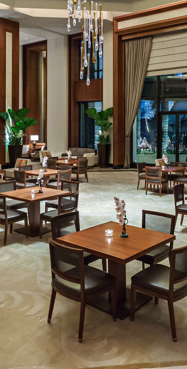 Elegant hotel lobby with chandelier lighting