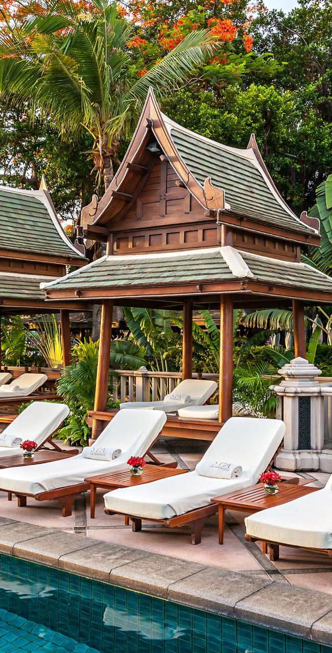 Luxury poolside with Thai-style cabanas