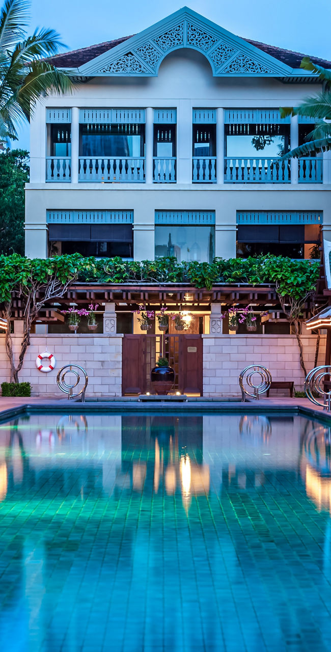 Luxury resort pool with tropical setting