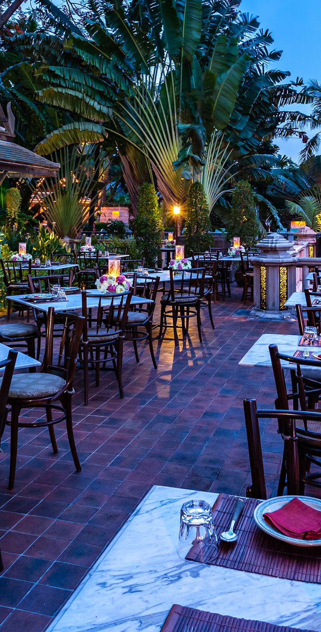 Outdoor riverside dining with evening ambiance
