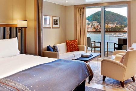 Modern hotel room with scenic balcony view