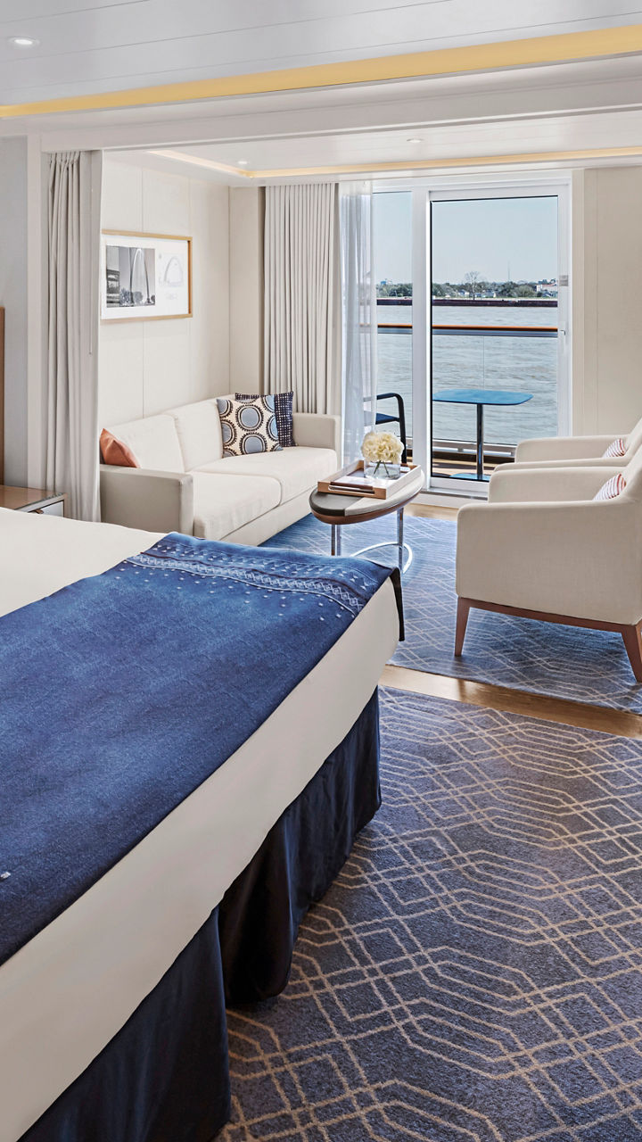 Modern cruise ship cabin with balcony view
