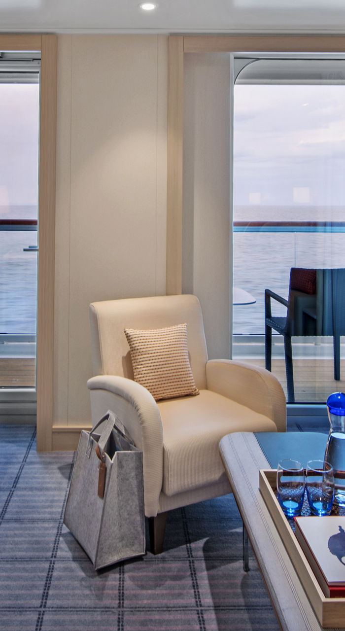 modern cruise ship suite with ocean view