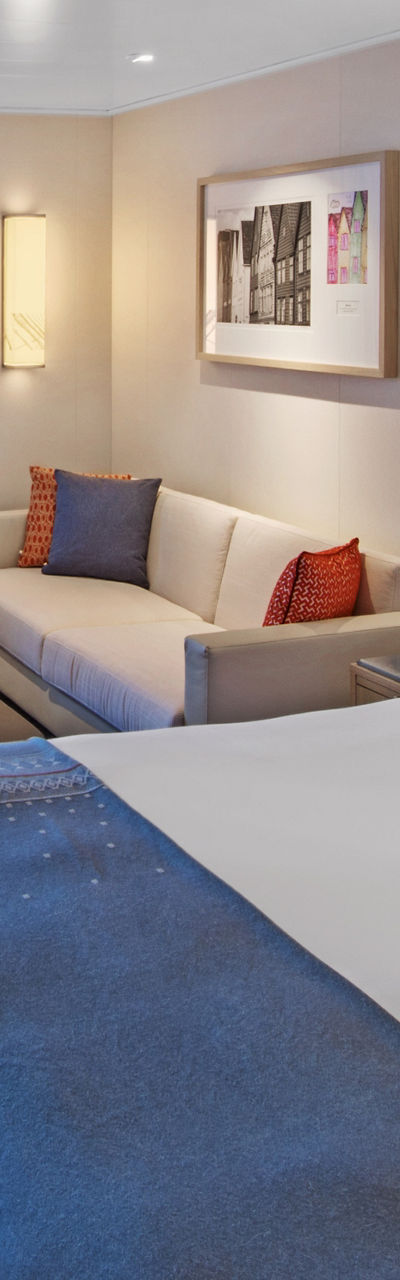 Modern cruise ship cabin with ocean view