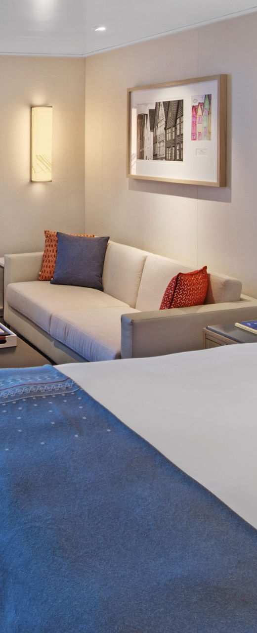 Modern cruise ship cabin with ocean view