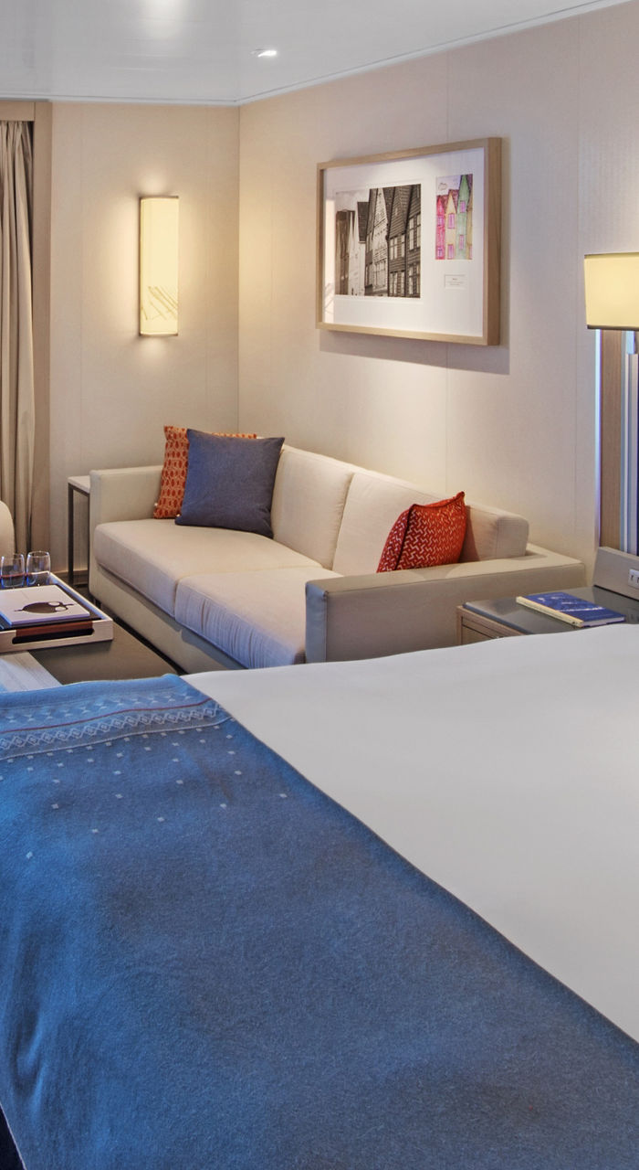 modern cruise ship cabin with ocean view