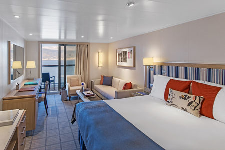 Modern cruise ship cabin with ocean view