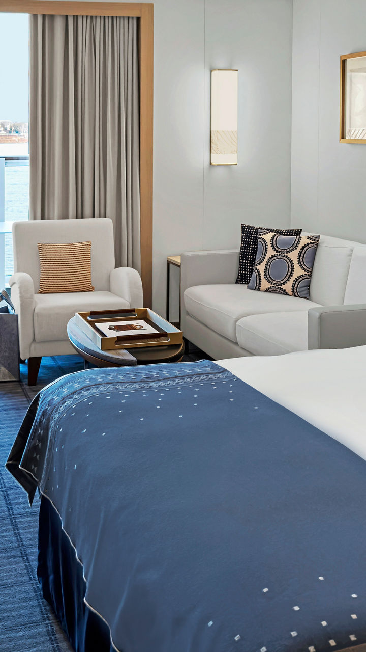 Modern hotel room with waterfront view