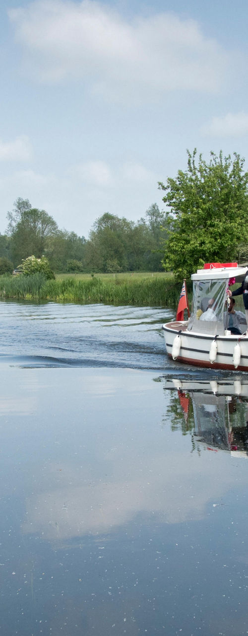 Scenic riverboat cruise on calm waters