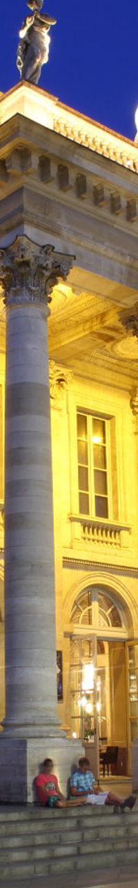 Illuminated Grand Theater at Night