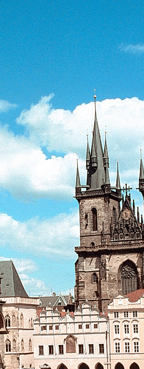 Historic Prague square with iconic towers