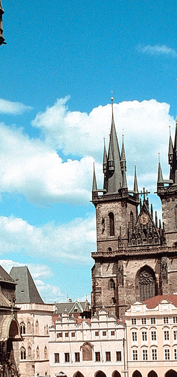 Historic Prague square with iconic towers