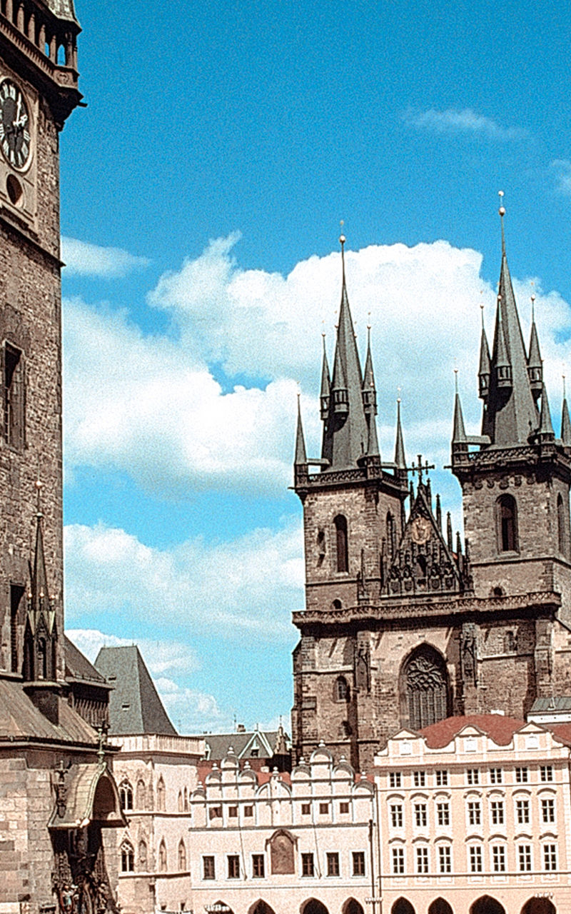 Historic Prague square with iconic towers