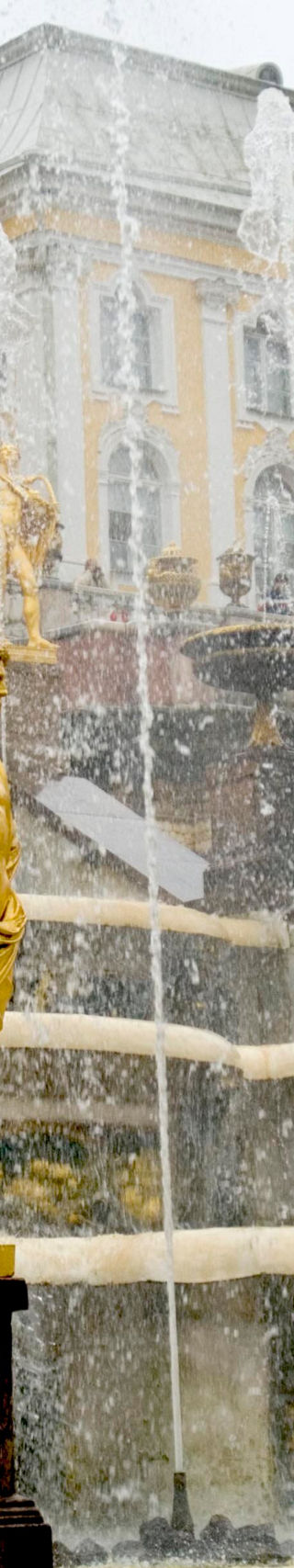 Golden statues and fountains at palace
