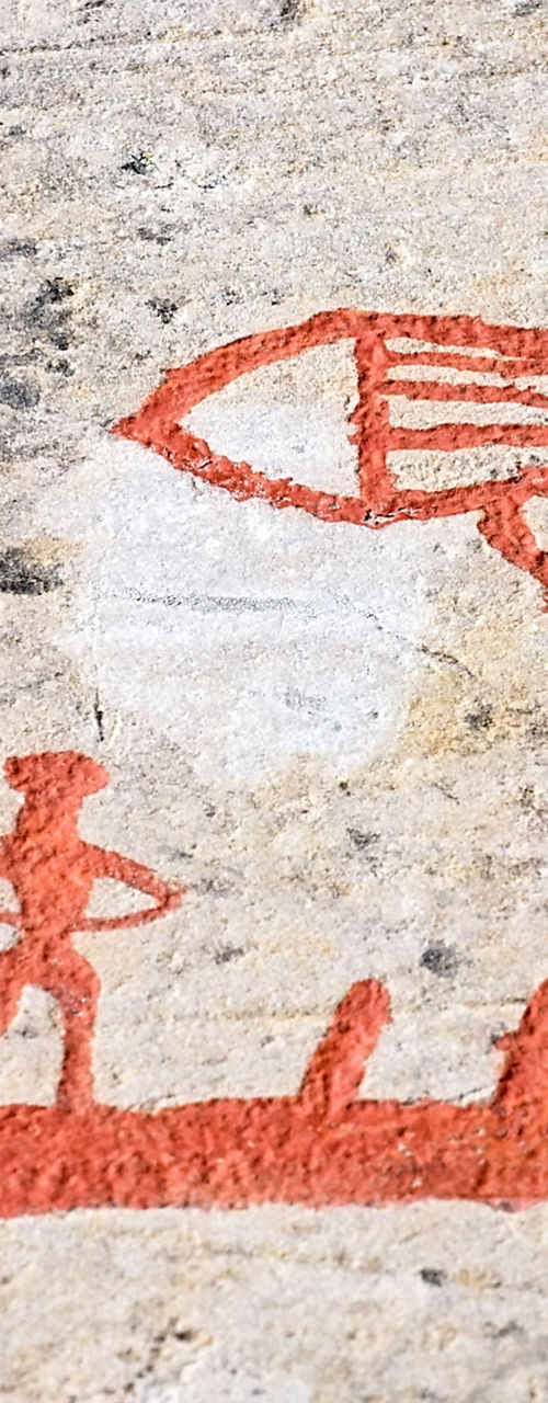 Ancient rock art depicting boat scene