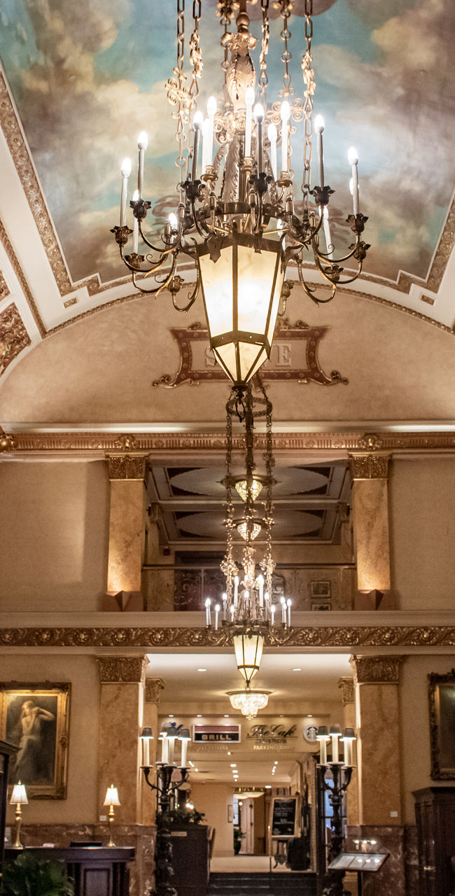 Elegant hotel lobby with ornate ceiling