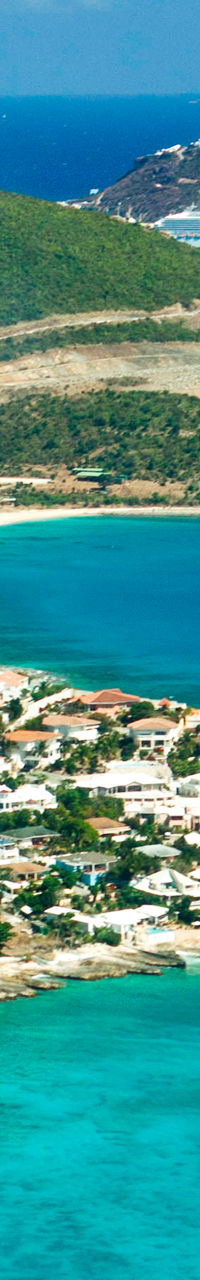 Aerial view of coastal town and turquoise sea