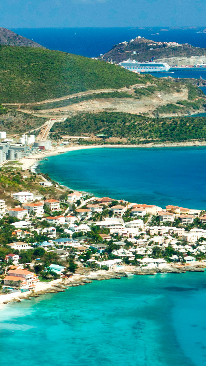 Aerial view of coastal town and turquoise sea