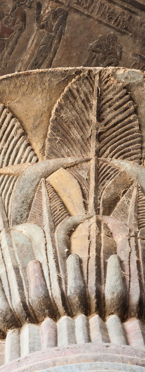 Ancient Egyptian column with intricate carvings