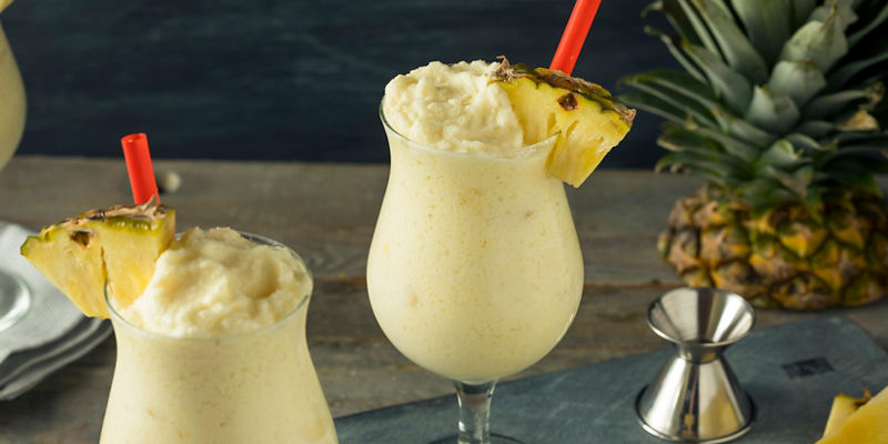 Refreshing pineapple smoothies with tropical garnish