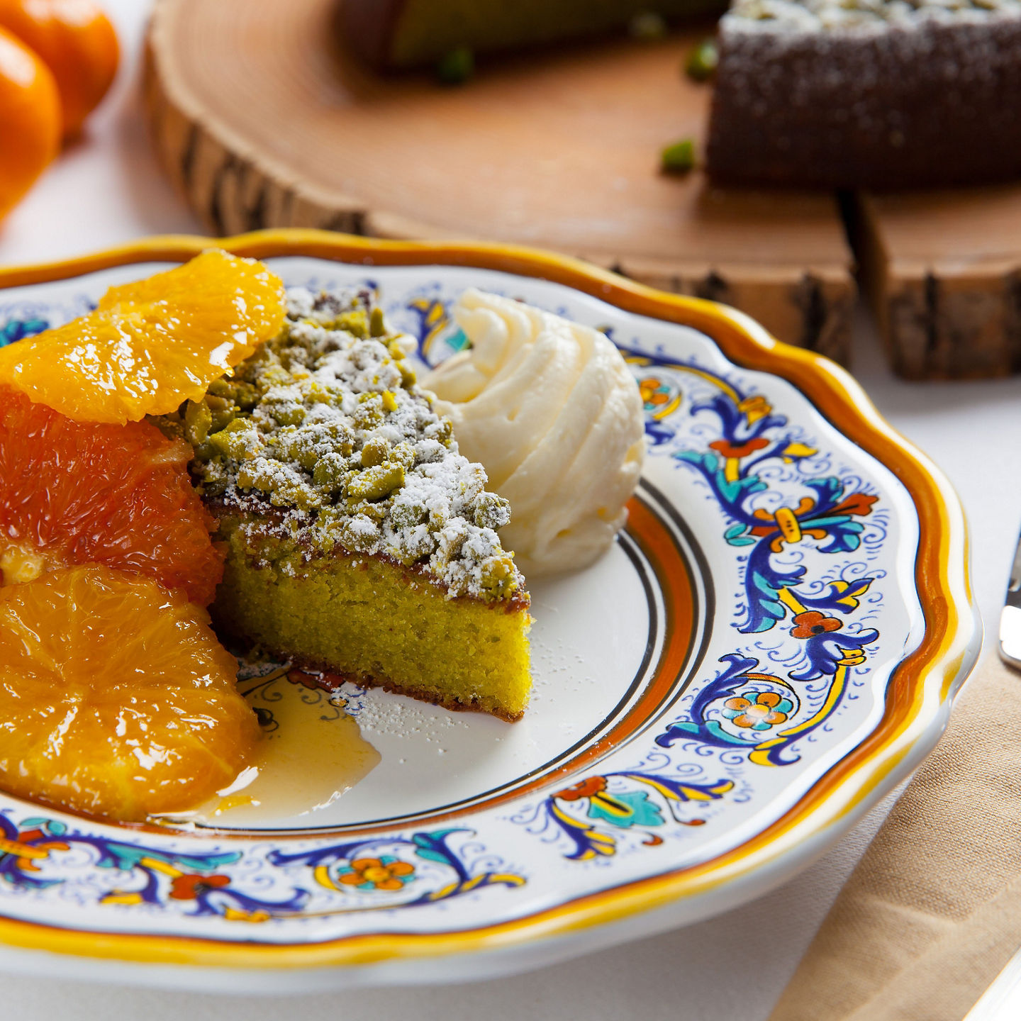 Citrus dessert with pistachio cake