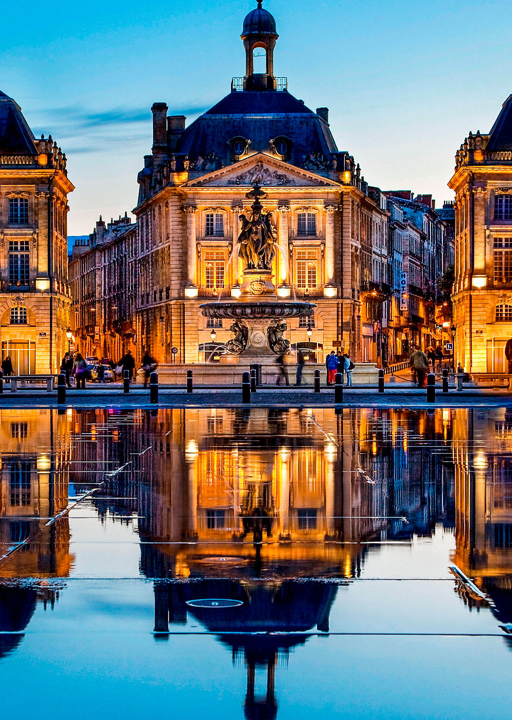Historic Bordeaux buildings at sunset reflection