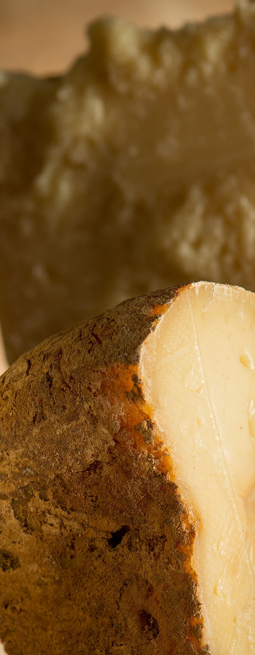 Assorted Artisan Cheeses on Wooden Board