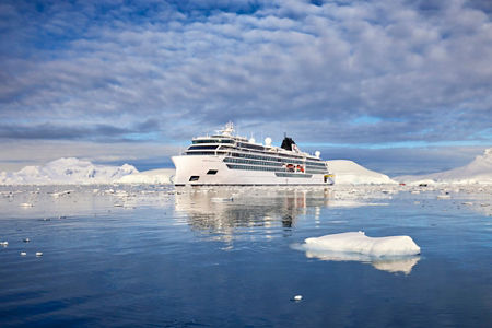 Luxury cruise ship in icy Antarctic waters