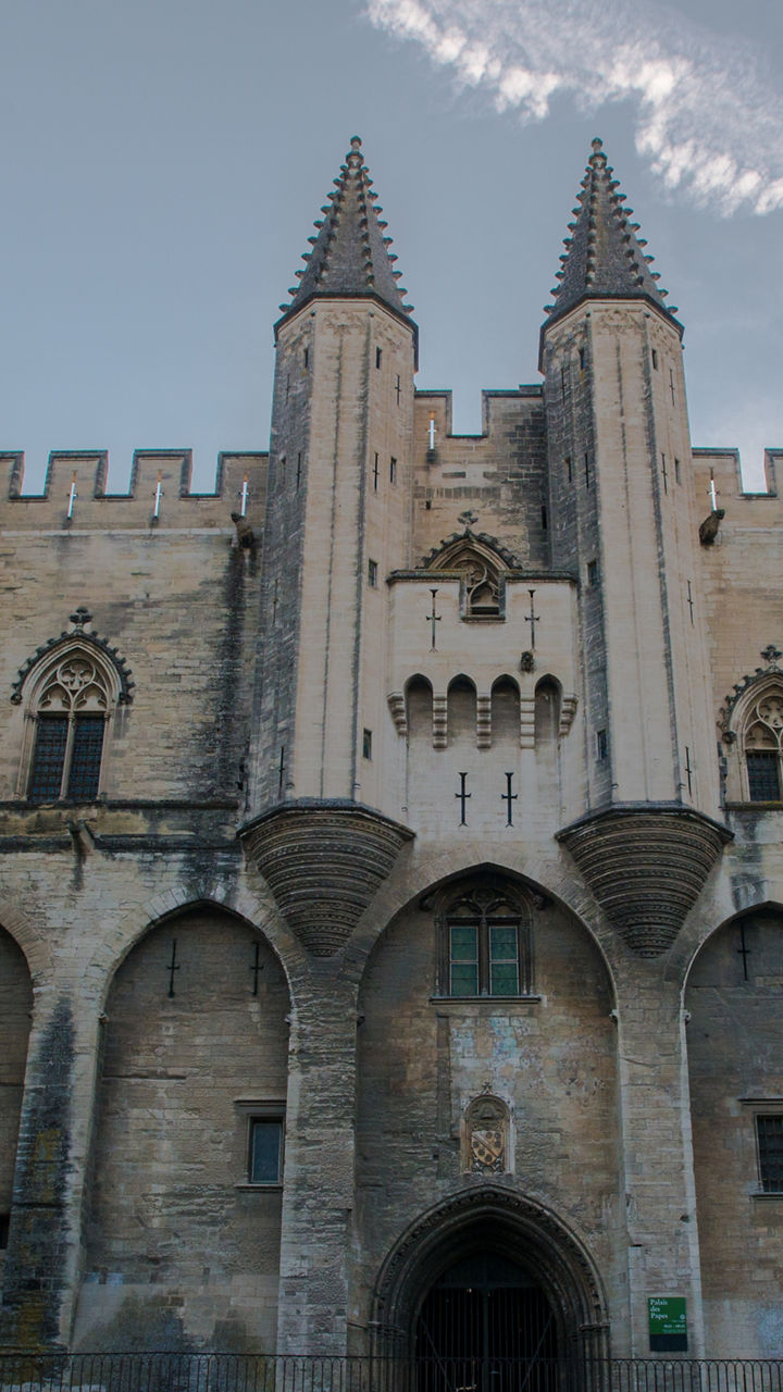 Historic stone castle with pointed towers