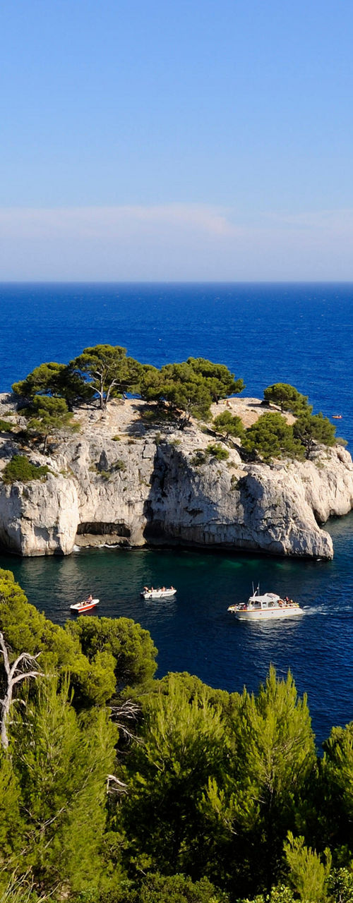 Scenic Mediterranean Cove with Sailboats