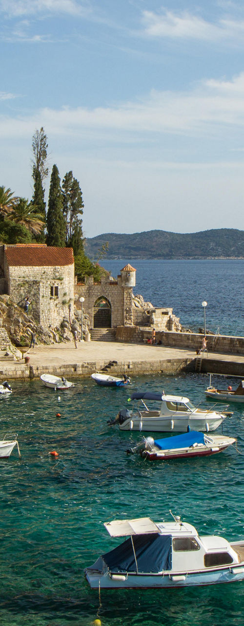 Scenic coastal village with docked boats