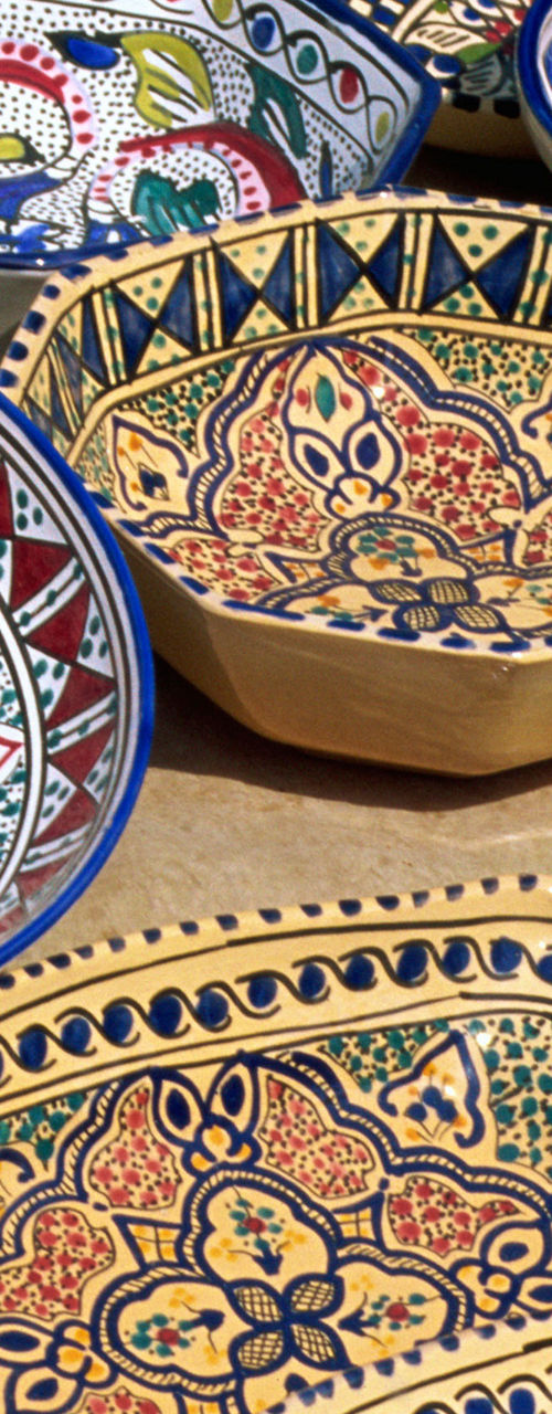 Colorful handcrafted ceramic bowls in vibrant patterns