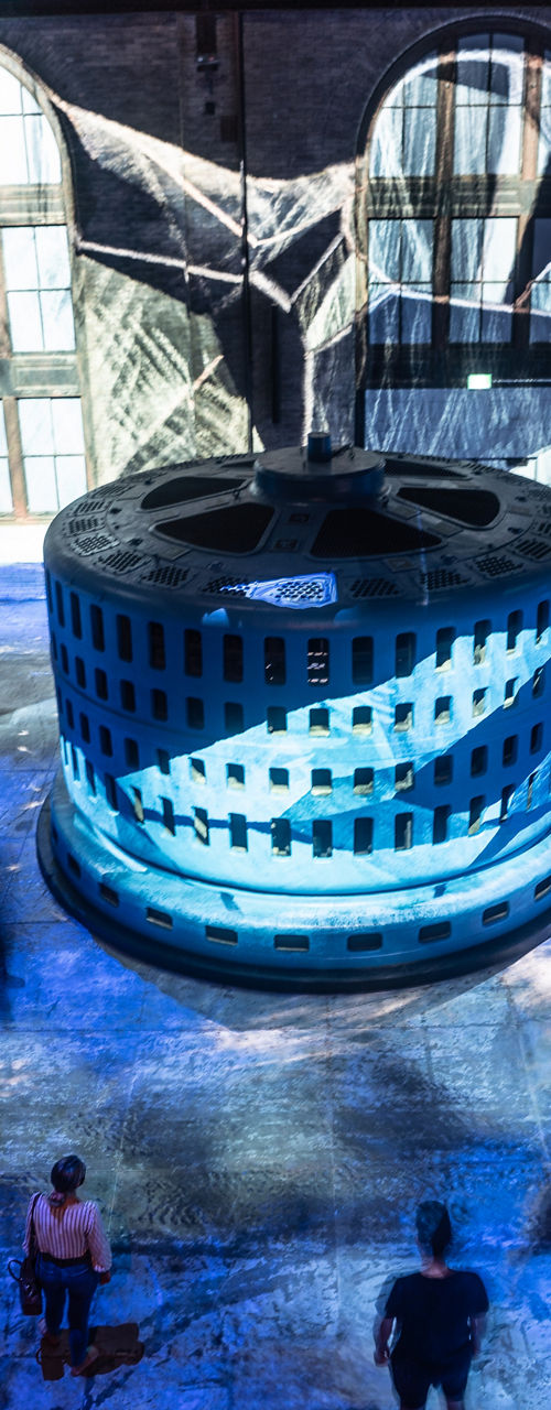 Immersive art installation with blue lighting