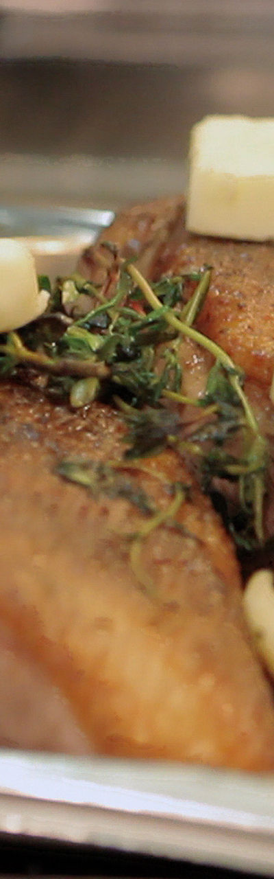 Seared meat with butter and herbs