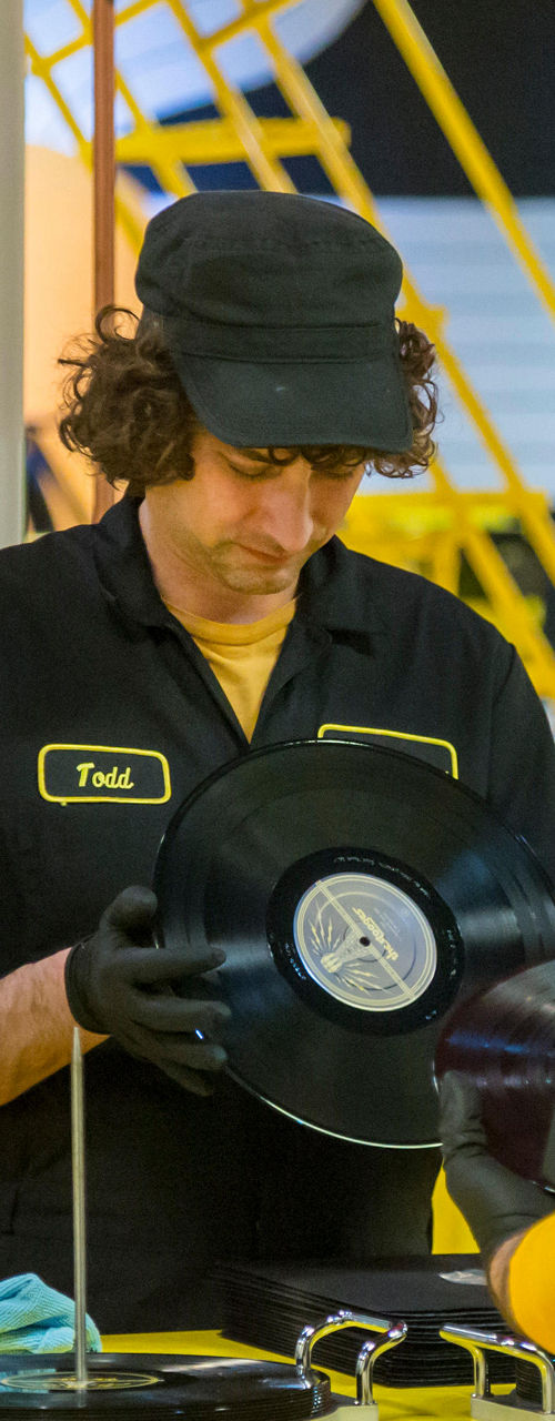 Workers inspecting vinyl records at Third Man Pressing