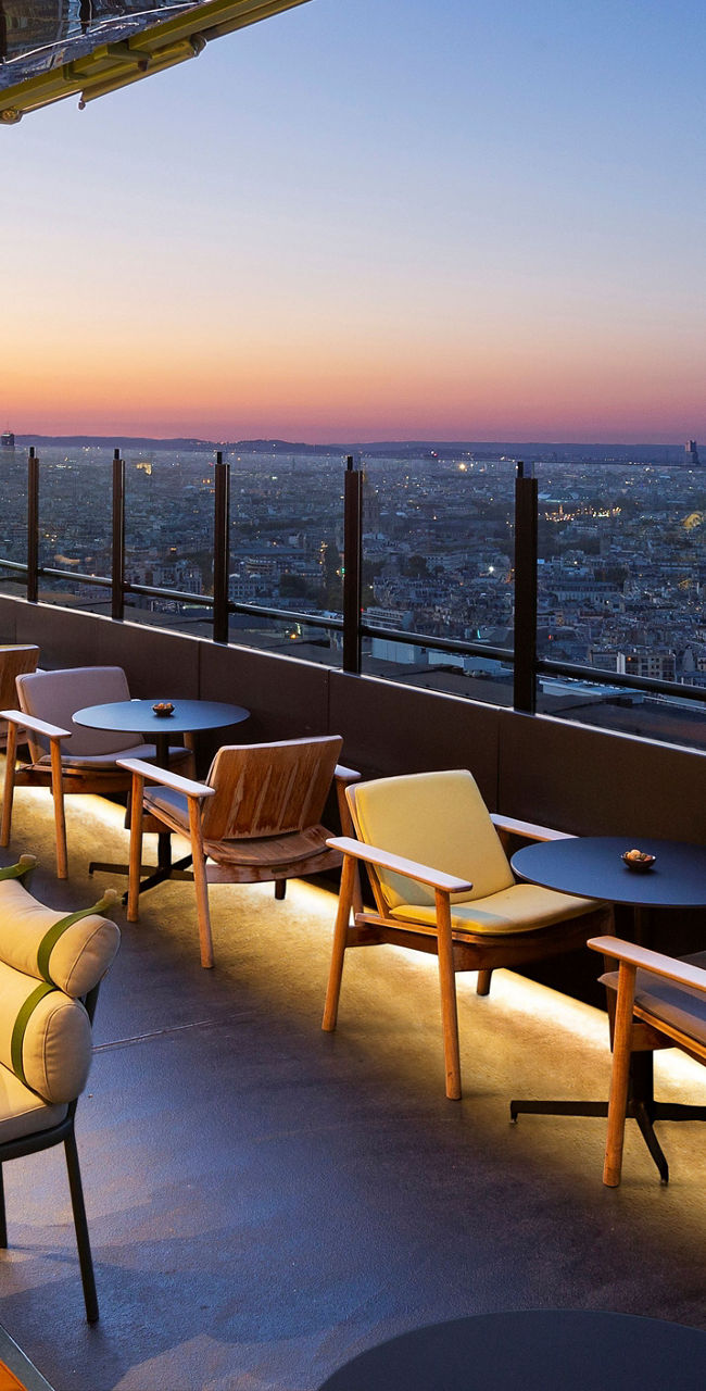 Rooftop lounge with city skyline view