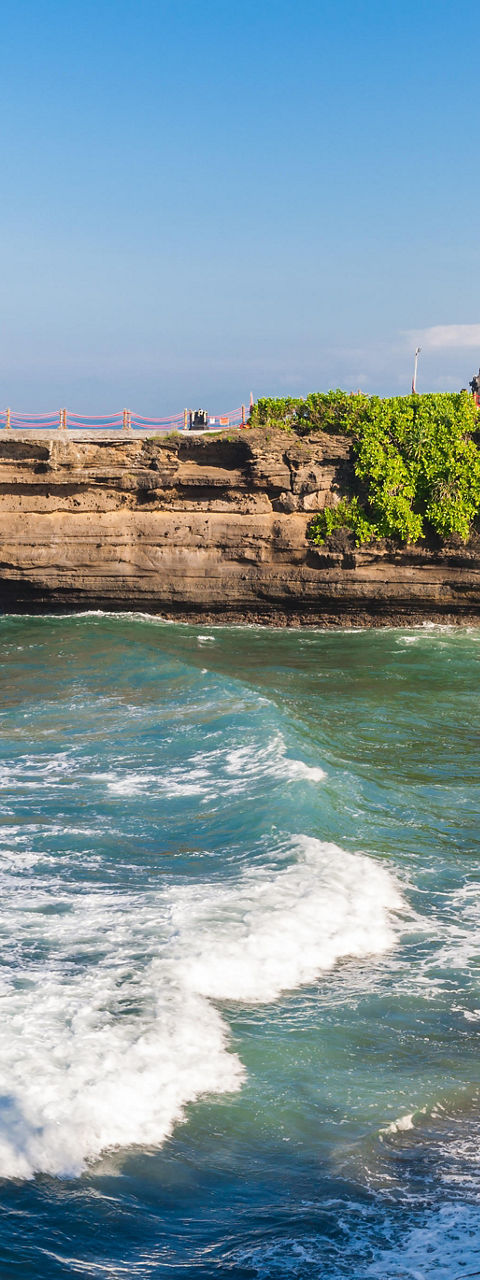 Scenic coastal view with rocky archway