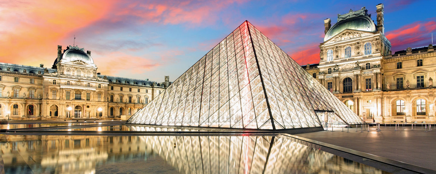 Louvre Pyramid at Sunset with Reflection