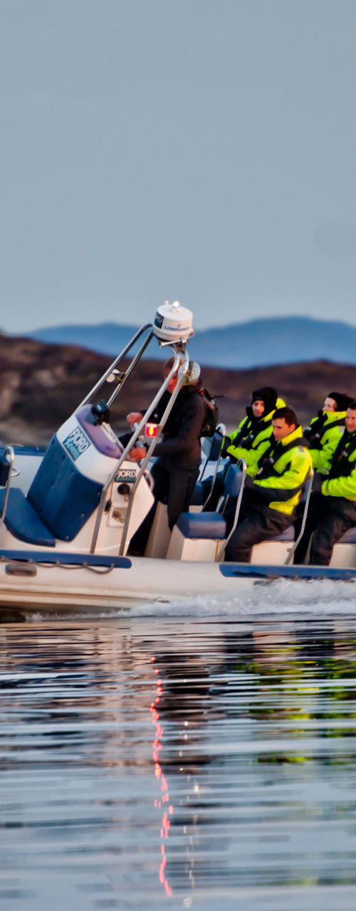 High-speed inflatable boat on calm water