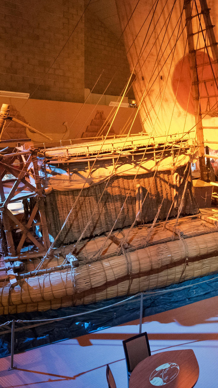 Traditional wooden sailing vessel in museum exhibit