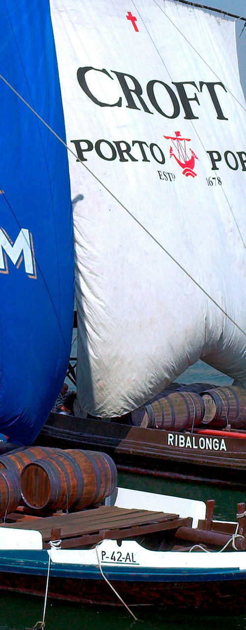 Traditional Porto boats with branded sails
