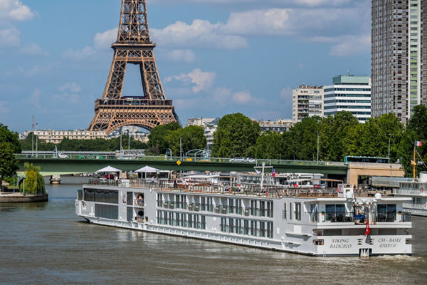 Cruise ship on Seine with Eiffel Tower view