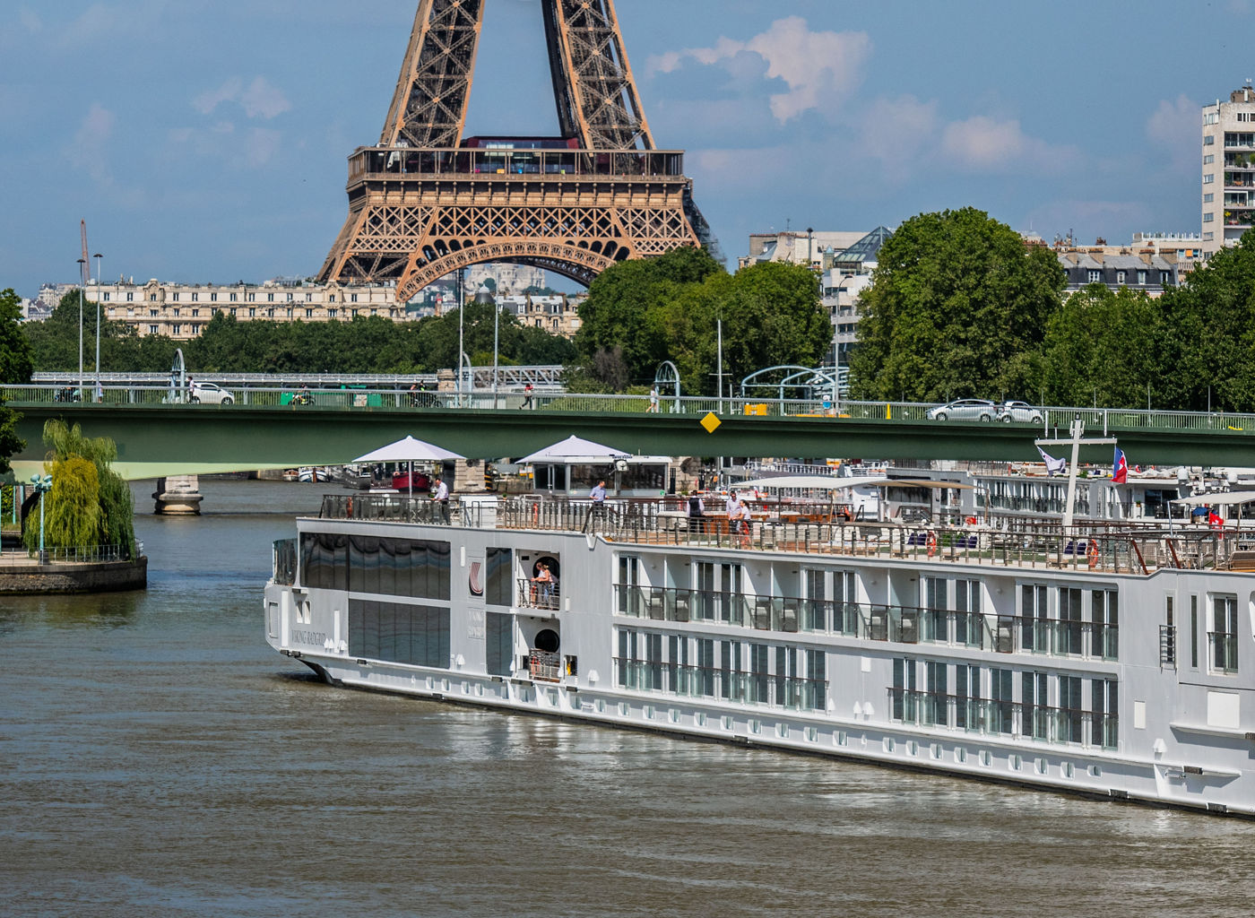 Cruise ship on Seine with Eiffel Tower view