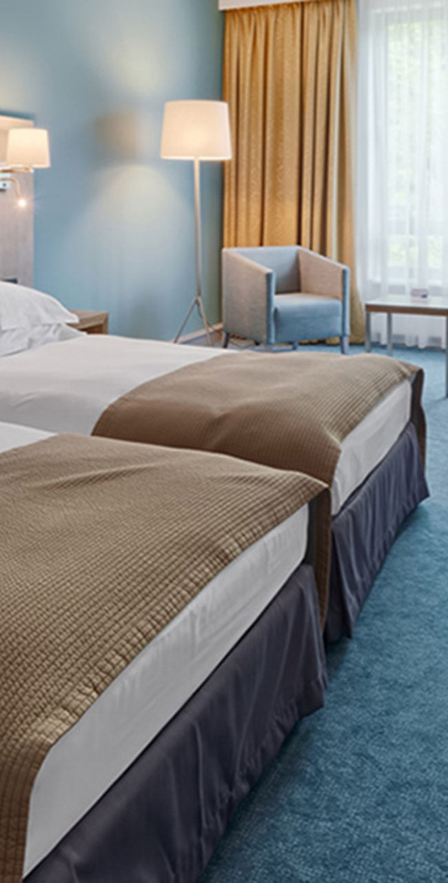 Modern hotel room with twin beds