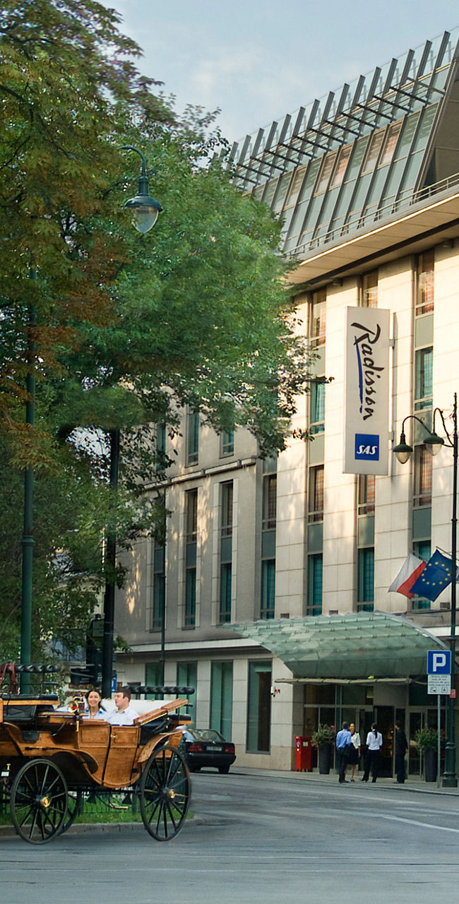 Elegant hotel with horse-drawn carriage